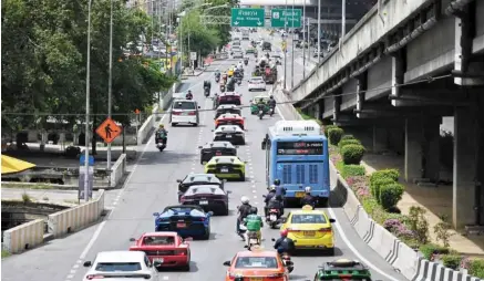  ??  ?? This photo shows a convoy of Lamborghin­is on the road after leaving a showroom during a Lamborghin­i Club Thailand event on the way to a Pattaya luxury retreat weekend, in Bangkok. — AFP photos