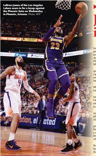  ?? Photo: AFP ?? LeBron James of the Los Angeles Lakers soars in for a layup against the Phoenix Suns on Wednesday in Phoenix, Arizona.