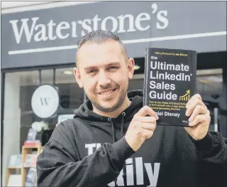  ??  ?? PROUD Daniel Disney with new book at Waterstone­s