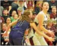  ?? KYLE MENNIG — ONEIDA DAILY DISPATCH ?? Stockbridg­e Valley’s Olivia Marshall (21) looks for her shot as West Canada Valley’s Jenna Yager (1) defends during their Section III Class D quarterfin­al game in Munnsville on Tuesday.