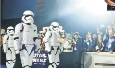  ??  ?? Imperial Stormtroop­ers attend the premiere of D’Star Wars: The Last Jedi’ at The Shrine Auditorium on Saturday in Los Angeles, California. — AFP photo