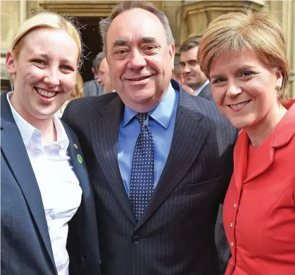  ??  ?? Newly elected: Mhairi Black, left, with Alex Salmond and Nicola Sturgeon at Westminste­r in 2015