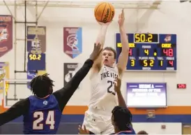  ?? ALLEN CUNNINGHAM/SUN-TIMES ?? Jake Fiegen (23) provides toughness for New Trier.