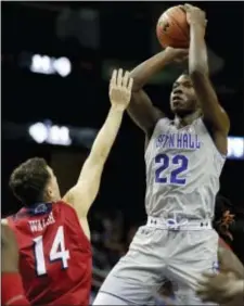  ?? JULIO CORTEZ — THE ASSOCIATED PRESS ?? Seton Hall’s Myles Cale (22) goes up for a shot against NJIT guard Reilly Walsh (14) during the second half Saturday in Newark, N.J. Seton Hall won 82-53.