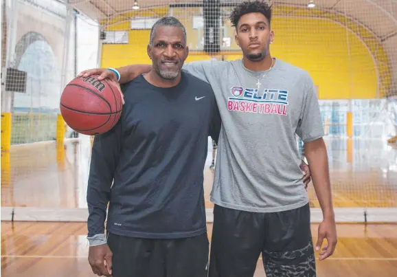  ??  ?? Bruce Bolden with his son Jonah, who has been drafted by the Philadelph­ia 76ers after playing success in Europe and the US