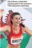  ??  ?? Olivia Breen celebrates winning gold in the women’s T38 long jump yesterday.
