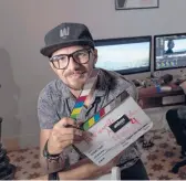  ?? RAMON ESPINOSA/AP ?? Carlos Gomez, 35, owner of the audiovisua­l production company Wajiros Films, poses for a photo at his company’s editing room Sept. 2 in Havana, Cuba.