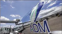  ?? AP 2009 ?? ADM’s adjusted earnings-per-share for the third quarter exceeded the highest estimate by analysts, while revenue was broadly in line. Its shares are up about 20 percent this year.