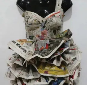  ??  ?? Paper dress by Rebecca Carney at The Lockyer Valley Art Gallery.