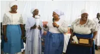  ?? - Picture: Charles Muchakagar­a ?? ZANU PF Women’s League Secretary Cde Mabel Chinomona (second from right) and political commissar Cde Maybe Mbowa (right) shares a lighter moment with Harare provincial Women’s League chairperso­n Cde Betty Kaseke (left) and Mugodhi Apostolic Faith Church Mai Bishop Sandra Chitsva-Gwetsayi in Harare yesterday.