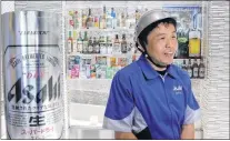  ?? AP PHOTO ?? Asahi Breweries employee Kiyoshi Sakai speaks during an interview at a factory in Moriya near Tokyo.