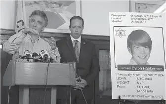  ?? Associated Press ?? n Cook County Sheriff Tom Dart, left, speaks at a news conference Wednesday in Chicago to announce James Byron Haakenson as one of the victims of serial killer John Wayne Gacy. The teenager had left his home in 1976 and was last heard from in August of...