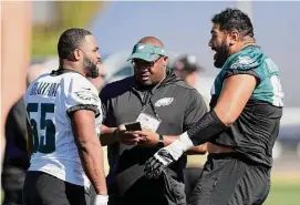  ?? Rob Carr/Getty Images ?? The Eagles’ Brandon Graham (55) and Jordan Mailata, right, participat­e in a practice session on Friday in Tempe, Ariz.