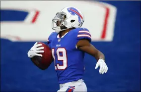  ?? JOHN MUNSON - THE ASSOCIATED PRESS ?? Buffalo Bills wide receiver Isaiah McKenzie (19) scores a touchdown in the first half of an NFL football game against the Miami Dolphins, Sunday, Jan. 3, 2021, in Orchard Park, N.Y.
