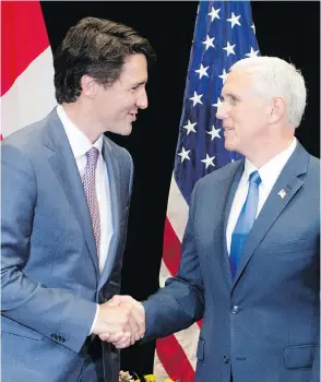  ?? RYAN REMIORZ / THE CANADIAN PRESS ?? Prime Minister Justin Trudeau meets with U.S. Vice President Mike Pence at a National Governors Associatio­n special session in Providence, R.I., Friday.
