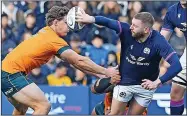  ?? ?? MAGIC: Finn Russell leads the Scotland attack