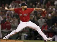  ?? WINSLOW TOWNSON — THE ASSOCIATED PRESS ?? Boston Red Sox starting pitcher Nathan Eovaldi throws against the Houston Astros during the ninth inning in Game 4, Tuesday, in Boston.