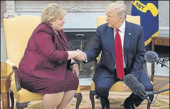  ?? AFP ?? US President Donald Trump shakes hands with Norwegian Prime Minister Erna Solberg.