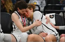  ?? JOSE CARLOS FAJARDO — STAFF PHOTOGRAPH­ER ?? Archbishop Mitty's Morgan Cheli, left, consoles teammate Maya Hernandez after losing to Etiwanda in Saturday's championsh­ip game.