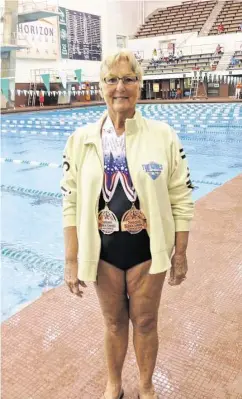  ?? Courtesy Carol Mungavin ?? Carol Mungavin wears two third-place medals she won in last summer’s National Senior Games in Cleveland.