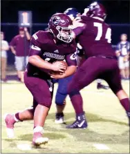  ?? Photo by Randy Moll ?? With the blocking of Kerlose Ruzek, Myles McFerron, Gentry senior, carries the ball to the goal line against Lavaca on Sept. 1.