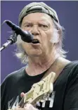  ?? TRISTAN FEWINGS/GET TY IMAGES ?? Neil Young is among several rock stars who enjoy their elaborate model train sets.