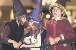  ?? BERNARD WEIL/TORONTO STAR FILE PHOTO ?? Nov. 16, 2001: Fans in Etobicoke await Harry Potter and the Philosophe­r’s Stone.