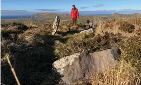  ?? ?? Billy Mag Fhloinn with the remnants of the tomb. Photograph: Seán Mac an tSíthigh/RTÉ News