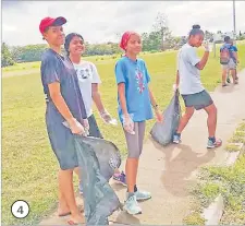  ?? Picture: SUPPLIED ?? 4. Nadi Wesley Church youth members in cheerful spirits during the clean-up of Votualevu area in Nadi.