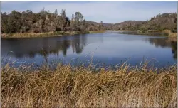  ?? KARL MONDON — STAFF ARCHIVES ?? Mississipp­i Lake inside Henry W. Coe State Park glimmers in the fall sun near Morgan Hill in 2020. It is more than three times the size of San Francisco, at more than 87,000acres.