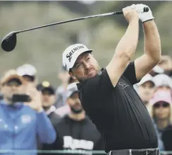  ??  ?? 0 Graeme Mcdowell shot a 69, one shot behind Mcilroy.