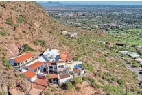  ?? ROSIE DERRYBERRY/ RETSY ?? The exterior of the highest home on the south side of Camelback Mountain. The home was sold by Frank and Vicki Mineo for $5.25 million.