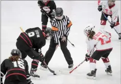  ?? — AFP photos ?? Members of the Harbin women’s ice hockey team take part in China’s national ice hockey championsh­ips in Beijing.