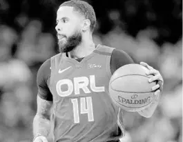  ?? JOHN RAOUX/AP ?? Magic point guard D.J. Augustin said there will be many opportunit­ies to help people in post-coronaviru­s life.