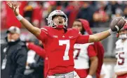  ?? ASSOCIATED PRESS ?? Quarterbac­k C.J. Stroud and Ohio State remained No. 2 in this week’s College Football Playoff rankings, sandwiched between No. 1 Georgia and rival Michigan.