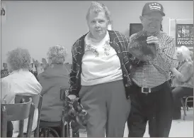  ?? Kathrine Kirby / RN-T ?? Georgia Mountain Music Club members Lee and Brenda Ivey, who have been married for 64 years, are named club sweetheart­s during the Valentine’s Day meeting at the Parker Center.