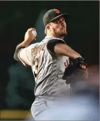  ?? Bay Area News Group/tns ?? Drew Pomeranz of the San Francisco Giants pitches against the Colorado Rockies in the first inning of a game at Coors Field on Tuesday in Denver.