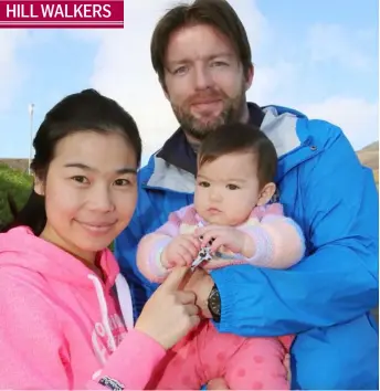  ??  ?? Chada, Martin and baby Erin McElroy, Kilkerley at the ‘Up the Hill for Jack and Jill’ walk held in Carlingfor­d.