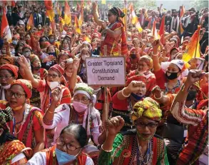  ?? — G.N. JHA ?? TIPRA Motha activists raising slogans during their two-day long dharna to demand Greater Tipraland in New Delhi on Tuesday.