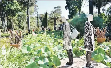  ?? Photograph­s by Stefanie Keenan ?? LOOKS FROM Valentino’s fall 2017 collection were displayed on mannequins scattered around Lotusland.