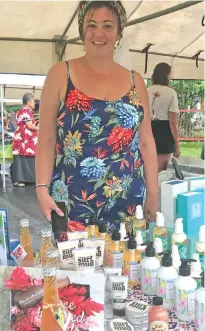  ?? Photo: Frederica Elblourne ?? Laura Cahir of Fiji Beachhouse with a Pacific range of products on sale at Suva Roc Market yesterday.