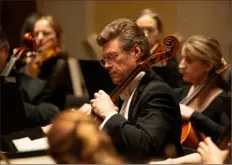  ?? Pittsburgh Symphony Orchestra ?? Cellist Mikhail Istomin performs with the Pittsburgh Symphony Orchestra on Friday at Heinz Hall.
