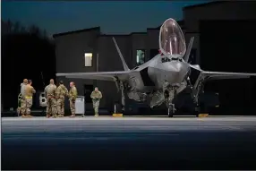  ?? (AP/U.S. Air Force/Tech. Sgt. Richard Mekkri) ?? Crews assigned to the 158th Fighter Wing meet Monday before launching F-35A Lightning II fifth generation aircraft assigned to the wing at the Vermont Air National Guard Base, South Burlington, Vt.