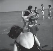  ??  ?? Wilmette, IL, Boy with Pipe at Shoreline, 1968.