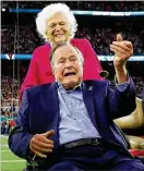  ?? CURTIS COMPTON / AJC 2017 ?? Former President George H.W. Bush does the coin toss with former First Lady Barbara Bush looking on when the Atlanta Falcons met the New England Patriots in Super Bowl LI.