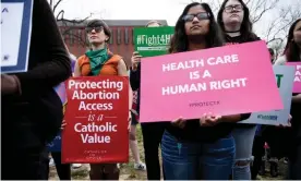  ?? Photograph: Brendan Smialowski/AFP/Getty Images ?? Activists rally to protest the Trump administra­tion’s ‘global gag rule’ on NGOs on 29 March in Washington DC.