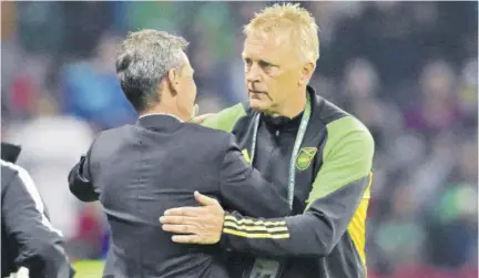  ?? (Photo: Observer file) ?? Mexico’s Argentine coach, Diego Cocca (left) and Jamaica’s Icelander coach, Heimir Hallgrimss­on greet each other before the Concacaf Nations League football match at Azteca Stadium in Mexico City on Sunday, March 26, 2023. The game ended 2-2.