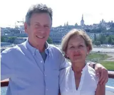  ??  ?? Paul Gilmore with partner Judy in Estonia while on a cruise this week.