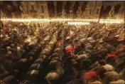  ?? EMRAH GUREL — THE ASSOCIATED PRESS ?? Muslim worshipper­s perform a night prayer called “tarawih” during the eve of the first day of the Muslim holy fasting month of Ramadan in Turkey at Hagia Sophia mosque in Istanbul on Friday.