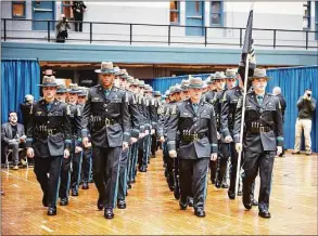  ?? Connecticu­t State Police / Contribute­d photo ?? The Connecticu­t State Police recently graduated 53 new state troopers, all members of the 131st Training Troop, at the Hartford Armory. Four are assigned to the Westbrook Troop F barracks. The latest subject of debate in Connecticu­t’s increasing­ly contentiou­s gubernator­ial election: a listicle from the website WalletHub.